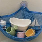Filet à ventouses pour ranger jouets de bain dans la salle de bain